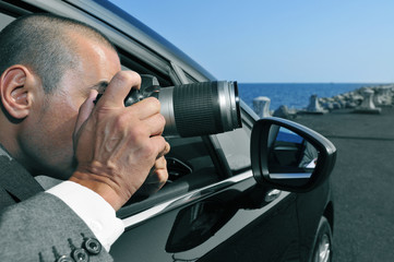 man stalking with camera