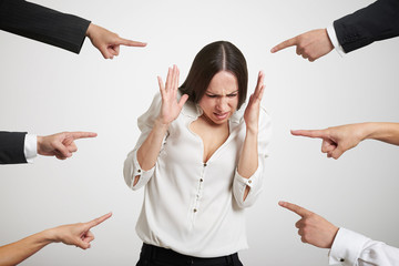 woman being pointed at