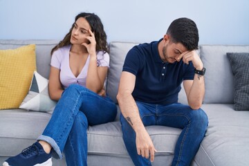 separated couple on couch