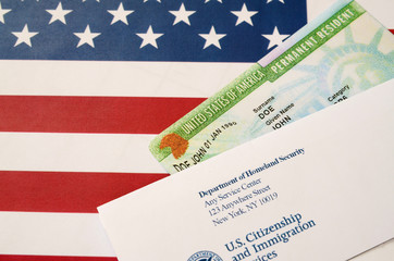 green card on american flag