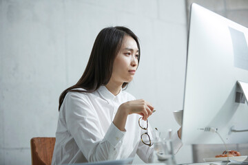 woman looking at computer